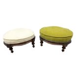 Two upholstered mahogany footstools with turned legs
