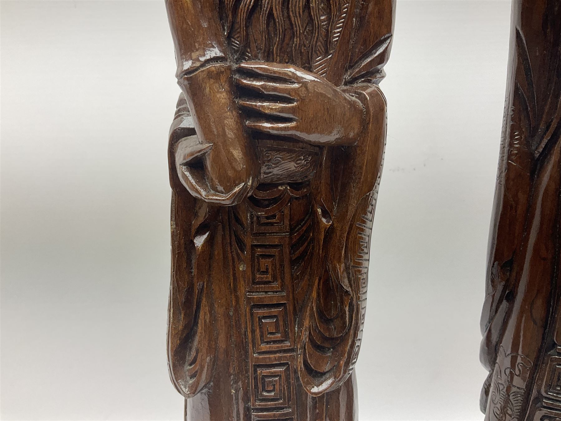 Two large hardwood Oriental figures carved as a man and woman donning robes upon naturalistic plinth - Image 3 of 19