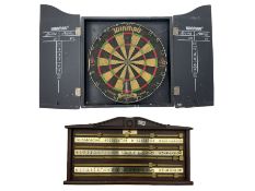 WINMAU dartboard and a snooker scoreboard