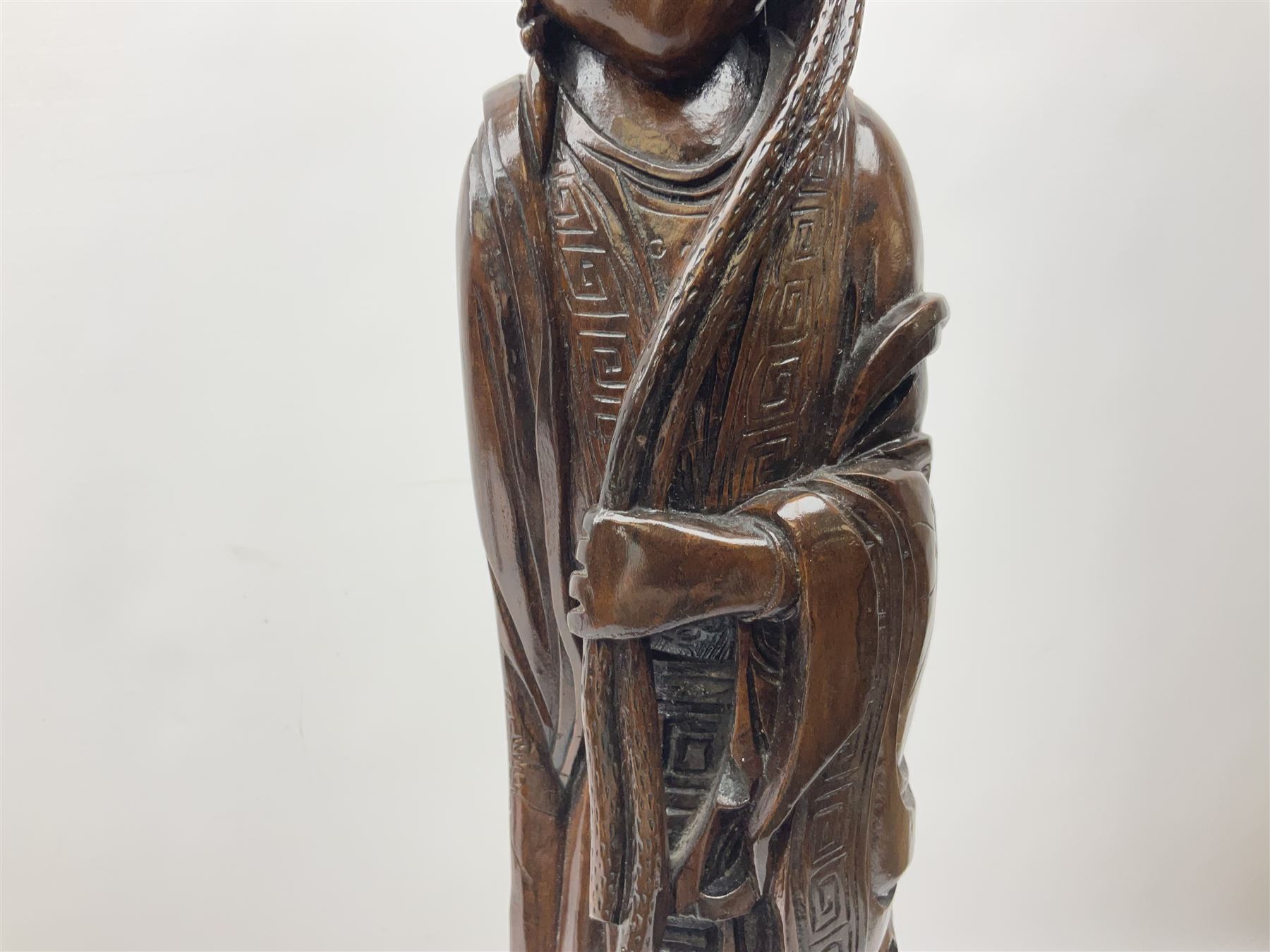 Two large hardwood Oriental figures carved as a man and woman donning robes upon naturalistic plinth - Image 11 of 19