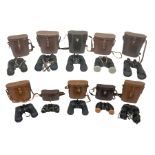 Ten cased pairs of binoculars