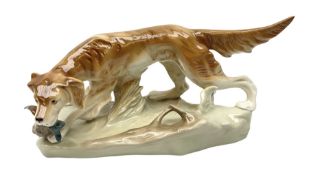 Royal Dux porcelain hunting dog with a bird