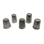 Five hallmarked silver thimbles