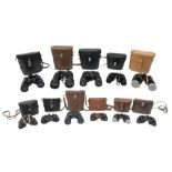 Eleven cased pairs of binoculars