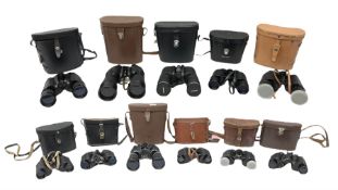 Eleven cased pairs of binoculars
