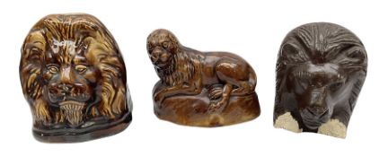 Two 19th century treacle glaze furniture/sash window rests modelled as lions