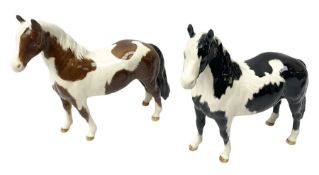 Two Beswick Pinto Ponies piebald and skewbald