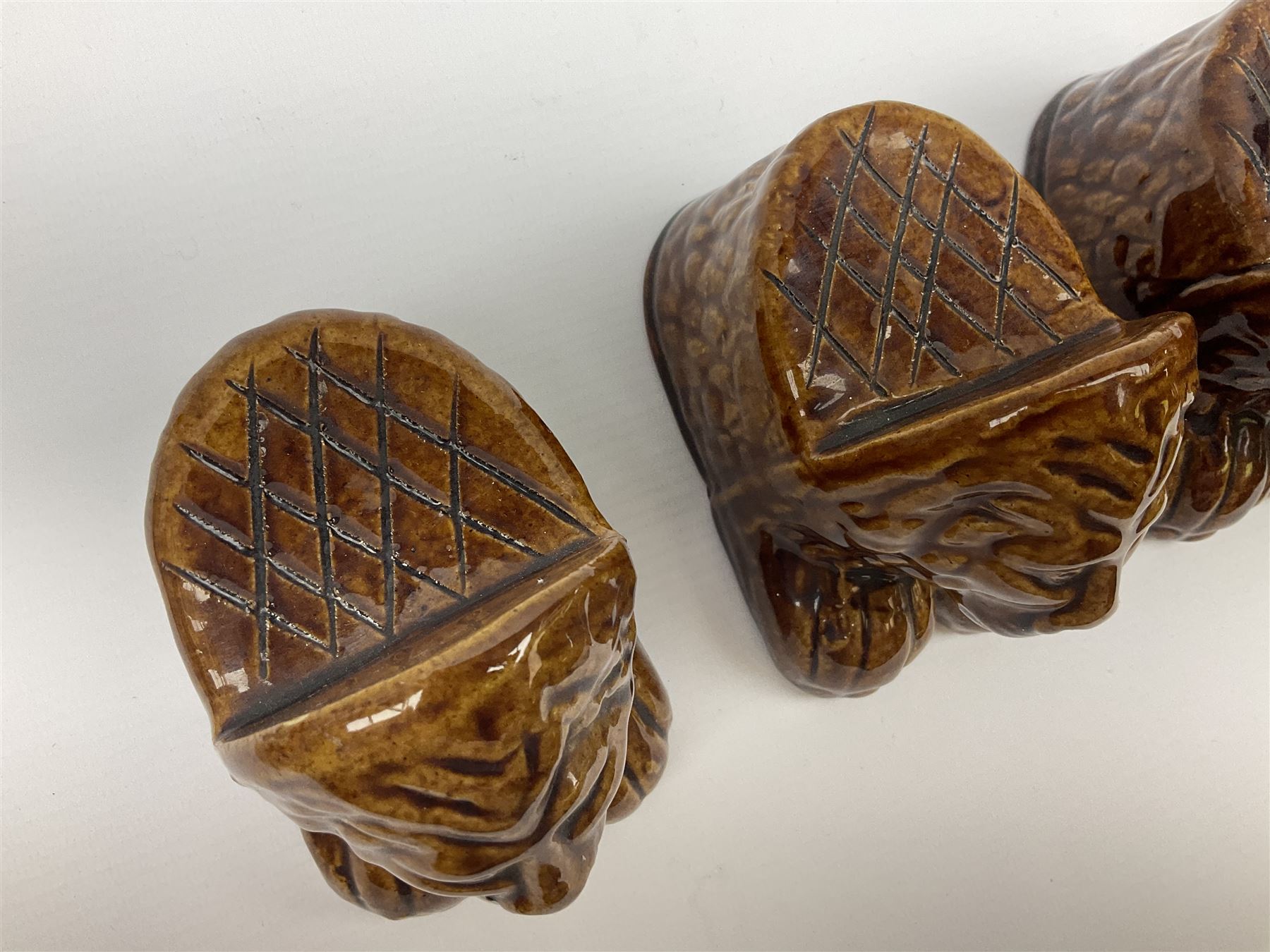 Set of four 19th century treacle glaze furniture/sash window rests modelled as lions - Image 3 of 13