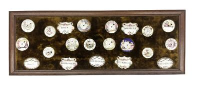 Collection of twenty one 18th and 19th century enamel wine labels and pocket watch faces
