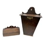 Two oak George III hanging candle boxes