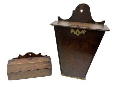 Two oak George III hanging candle boxes