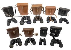 Nine cased pairs of binoculars