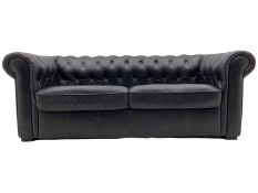 Chesterfield sofa upholstered in black buttoned leather
