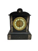 A late 19th century Belgium slate mantle clock decorated with variegated panels of contrasting marbl