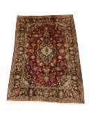 Persian Kashan deep red ground rug