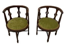 Pair of Edwardian mahogany tub shaped chairs