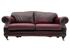 Thomas Lloyd - three seat sofa upholstered in red leather