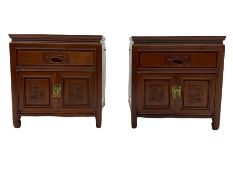 A pair of Chinese hardwood lamp cabinets