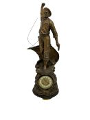 An imposing bronzed spelter clock depicting a 19th century fisherman