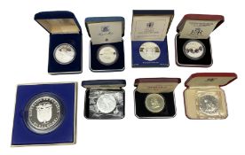 Eight cased silver coins