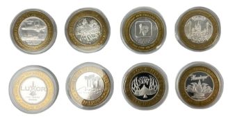 Eight Las Vegas limited edition ten dollar casino silver strike gaming tokens