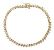 Gold round brilliant cut diamond 'S' link line bracelet