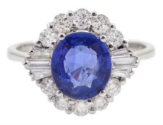 18ct white gold oval sapphire and tapered baguette and round brilliant cut diamond cluster ring