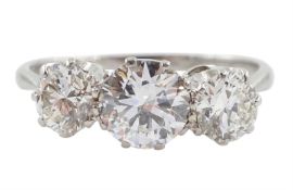 Platinum three stone round brilliant cut diamond ring