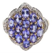 9ct gold marquise shaped tanzanite and diamond chip cluster ring