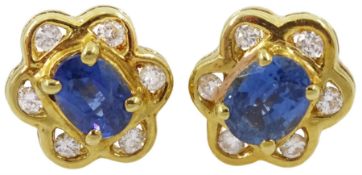 Pair of 18ct gold sapphire and diamond cluster stud earrings