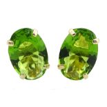 Pair of 9ct gold oval green stone stud earrings