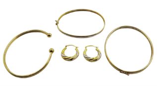 Pair of 9ct gold hoop earrings with twisted decoration and three 9ct gold bangles
