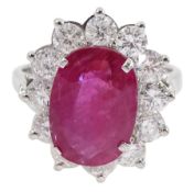 18ct white gold oval ruby and round brilliant cut diamond cluster ring
