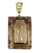 Large gold mounted emerald cut smoky quartz pendant