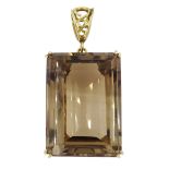 Large gold mounted emerald cut smoky quartz pendant