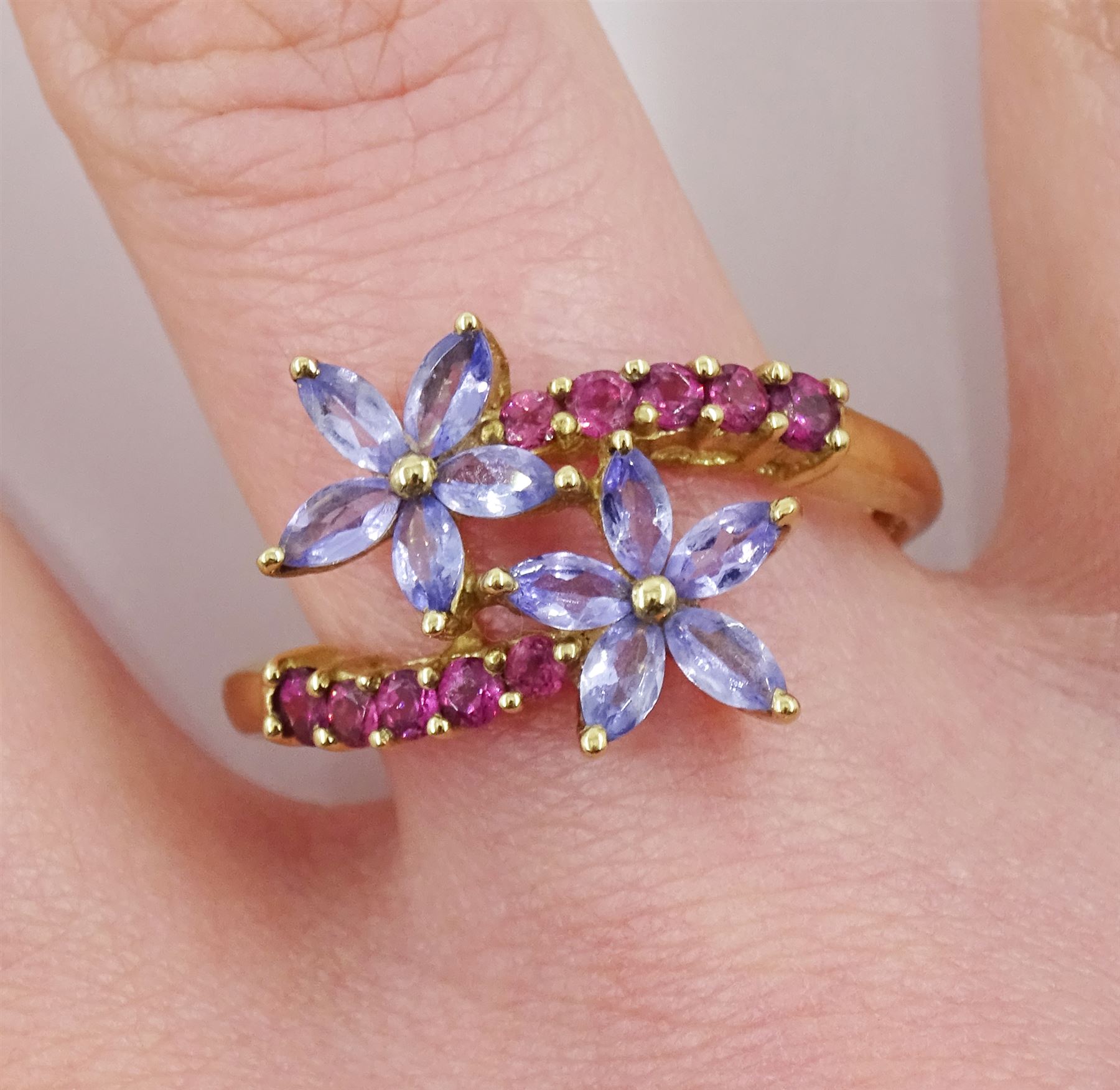 9ct gold marquise shaped tanzanite and pink stone set flower crossover ring - Image 2 of 4