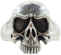 Silver skull torque bangle