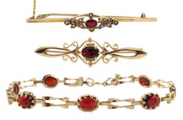 Gold cabochon garnet link bracelet and two gold garnet brooches