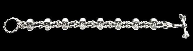 Silver skull and crossbones link bracelet