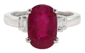 18ct gold oval ruby and baguette diamond ring