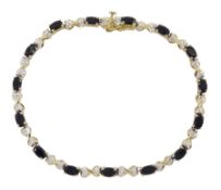 9ct gold oval sapphire and diamond link bracelet