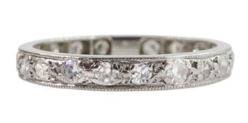 Early-mid 20th century platinum channel set diamond eternity ring
