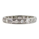 Early-mid 20th century platinum channel set diamond eternity ring