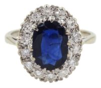 18ct white gold oval sapphire and diamond cluster ring