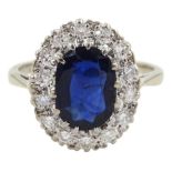 18ct white gold oval sapphire and diamond cluster ring