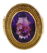 Gold oval amethyst ring