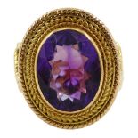 Gold oval amethyst ring