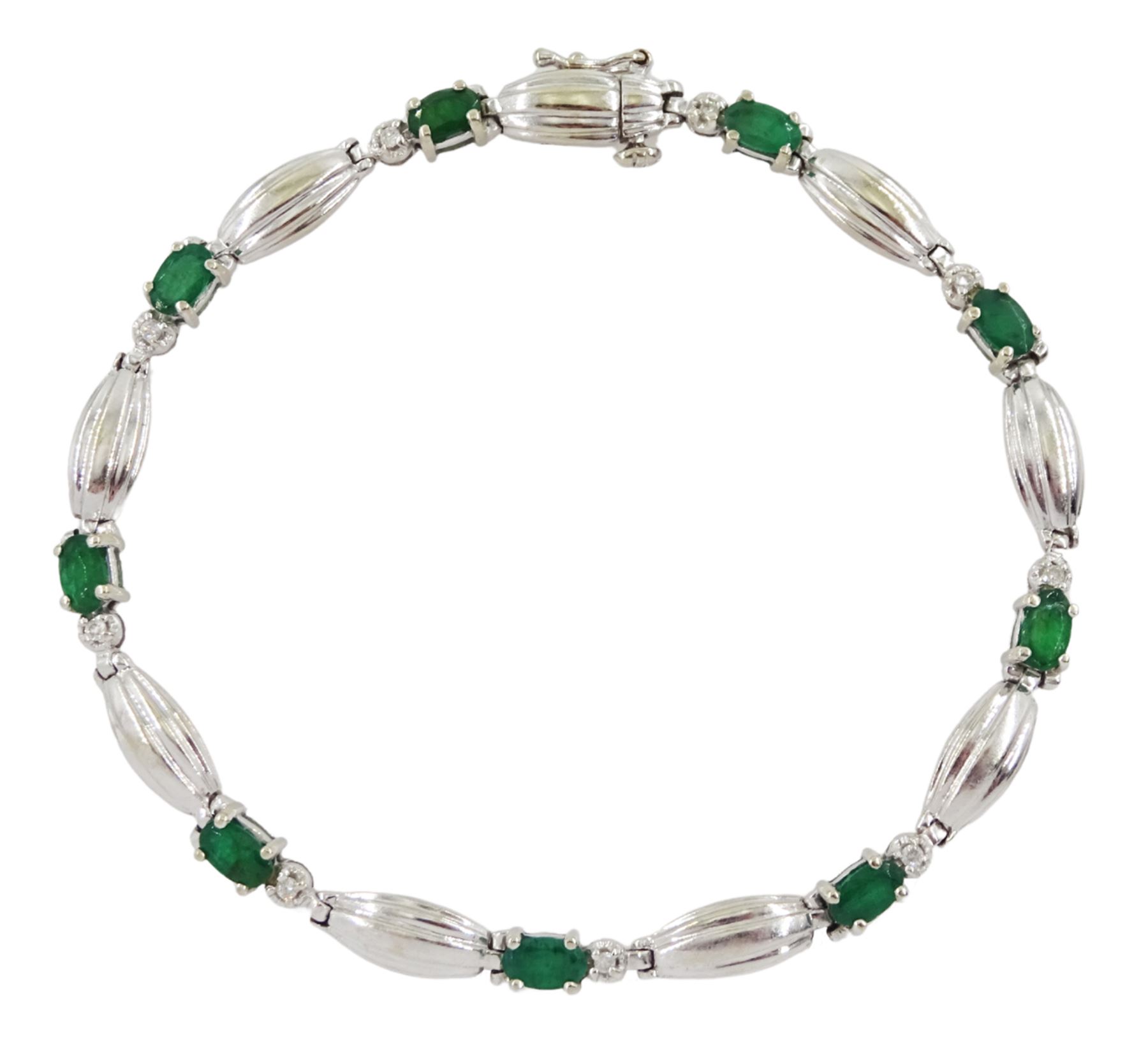 9ct white gold oval emerald and diamond link bracelet