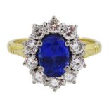 18ct gold oval Ceylon sapphire and round brilliant cut diamond cluster ring