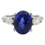 Platinum oval Ceylon sapphire and marquise shape diamond three stone ring